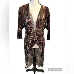 Lularoe Shirley . Camo accordion style, stretch.